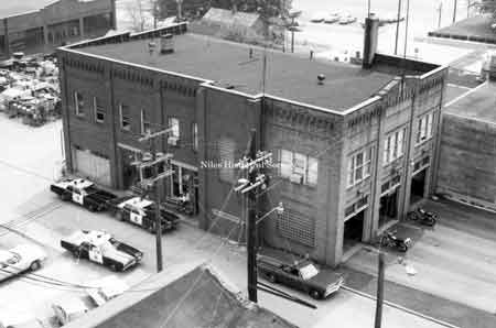 Photo taken of the old Police and Fire Station built in 1889 located on the east side of the Post Office, on West Park Avenue in downtown Niles before urban renewal.