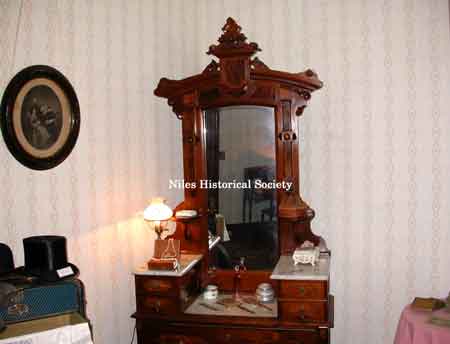 Victorian dresser with mirror.